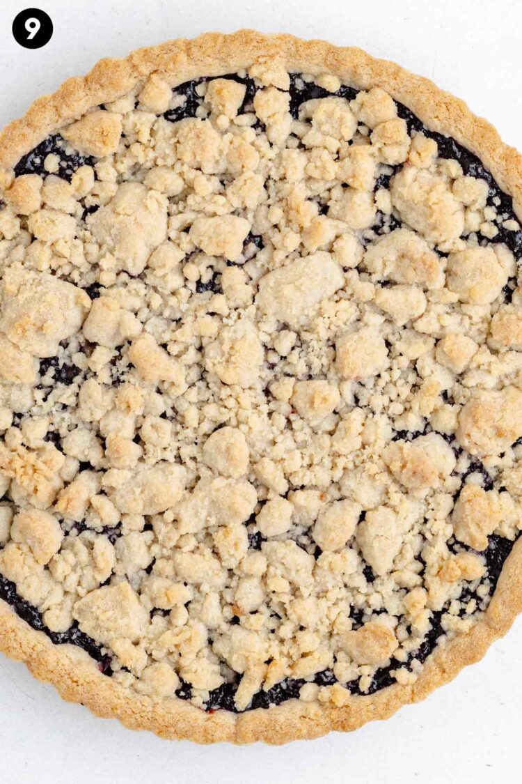 close-up of the finished cherry tart on a white table