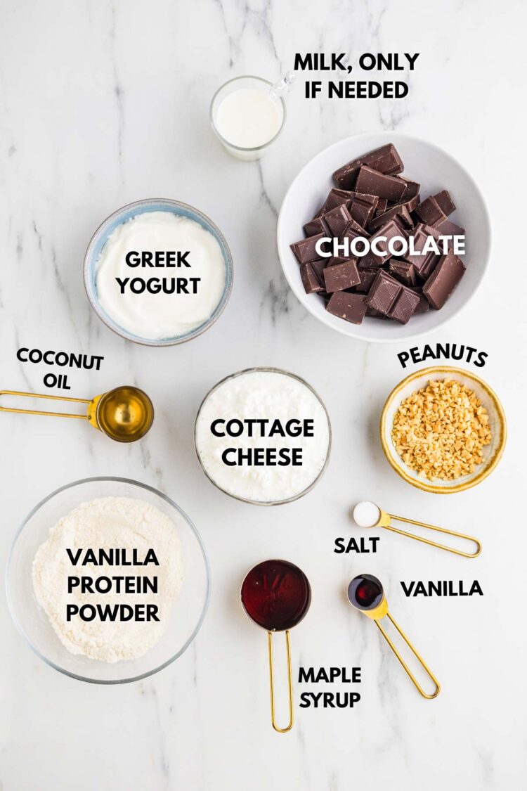 ingredients laid out to make protein ice cream bars on a white table