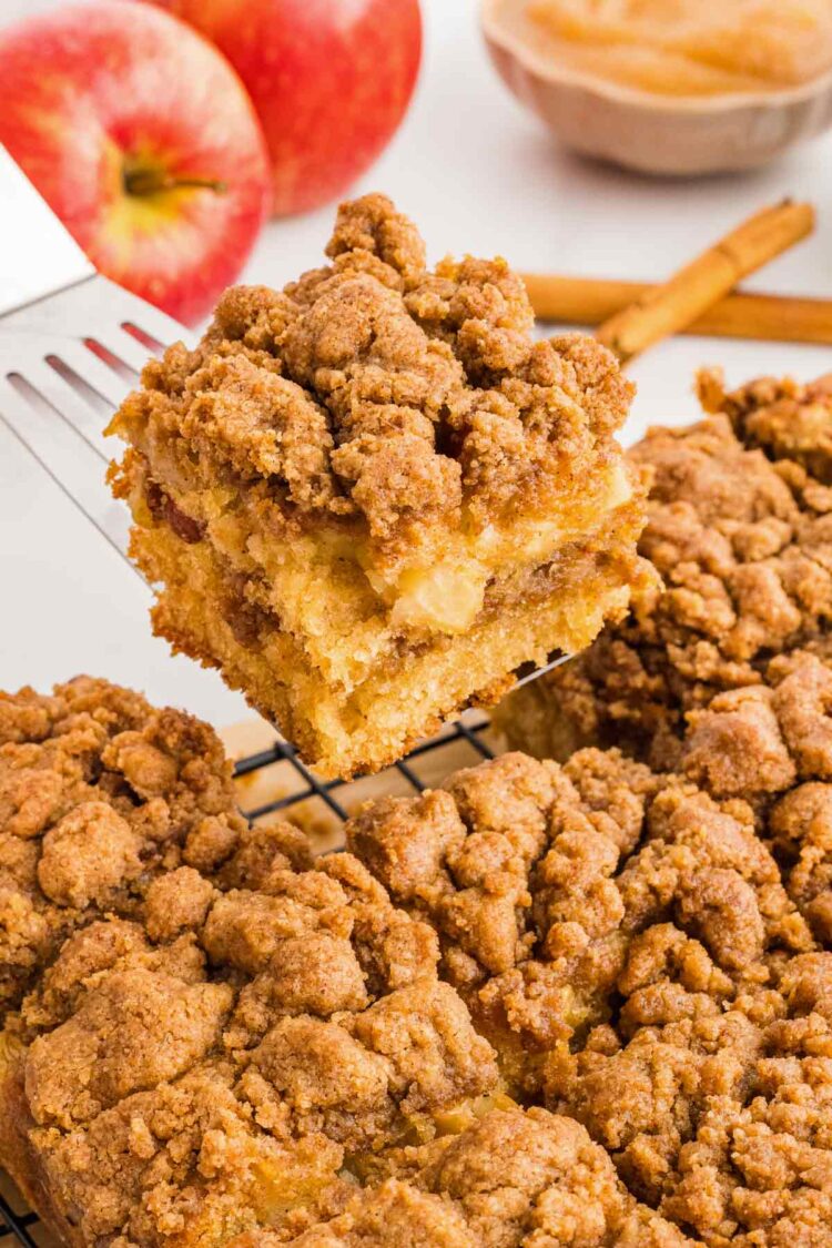 applesauce coffee cake slice being lifted on cake server
