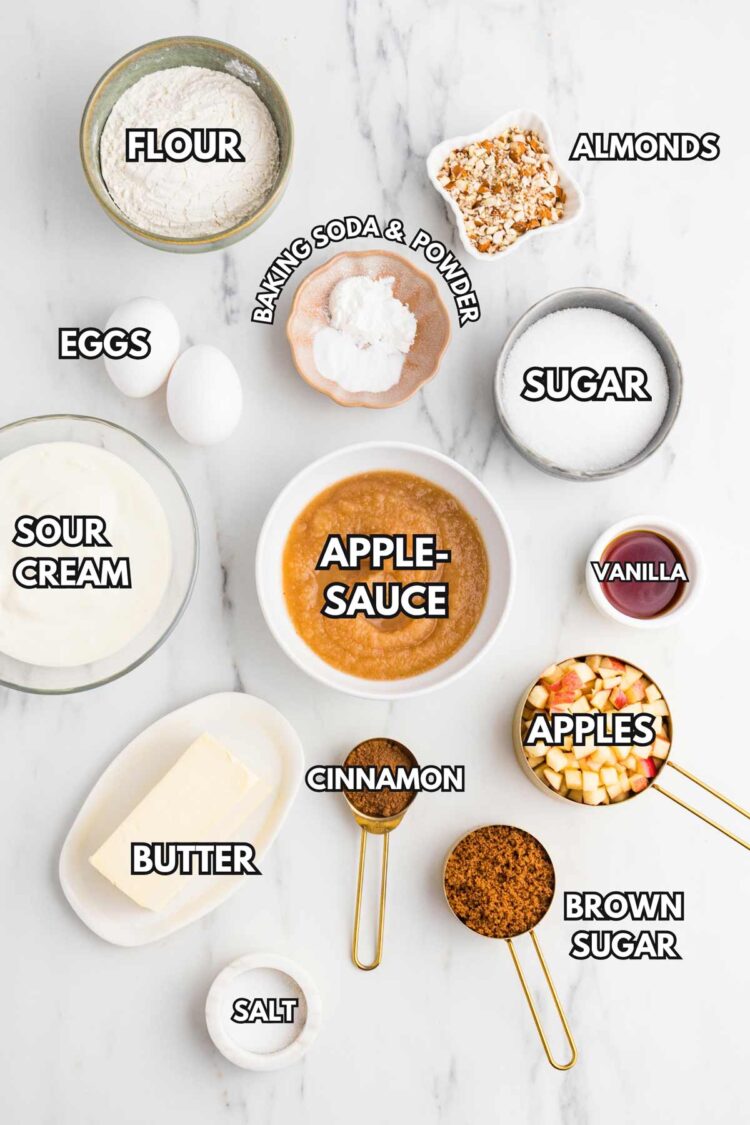 ingredients laid out to make applesauce coffee cake on a white table