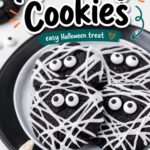 pin image for mummy cookies showing them on a white plate with a plastic skeleton hand reaching for one